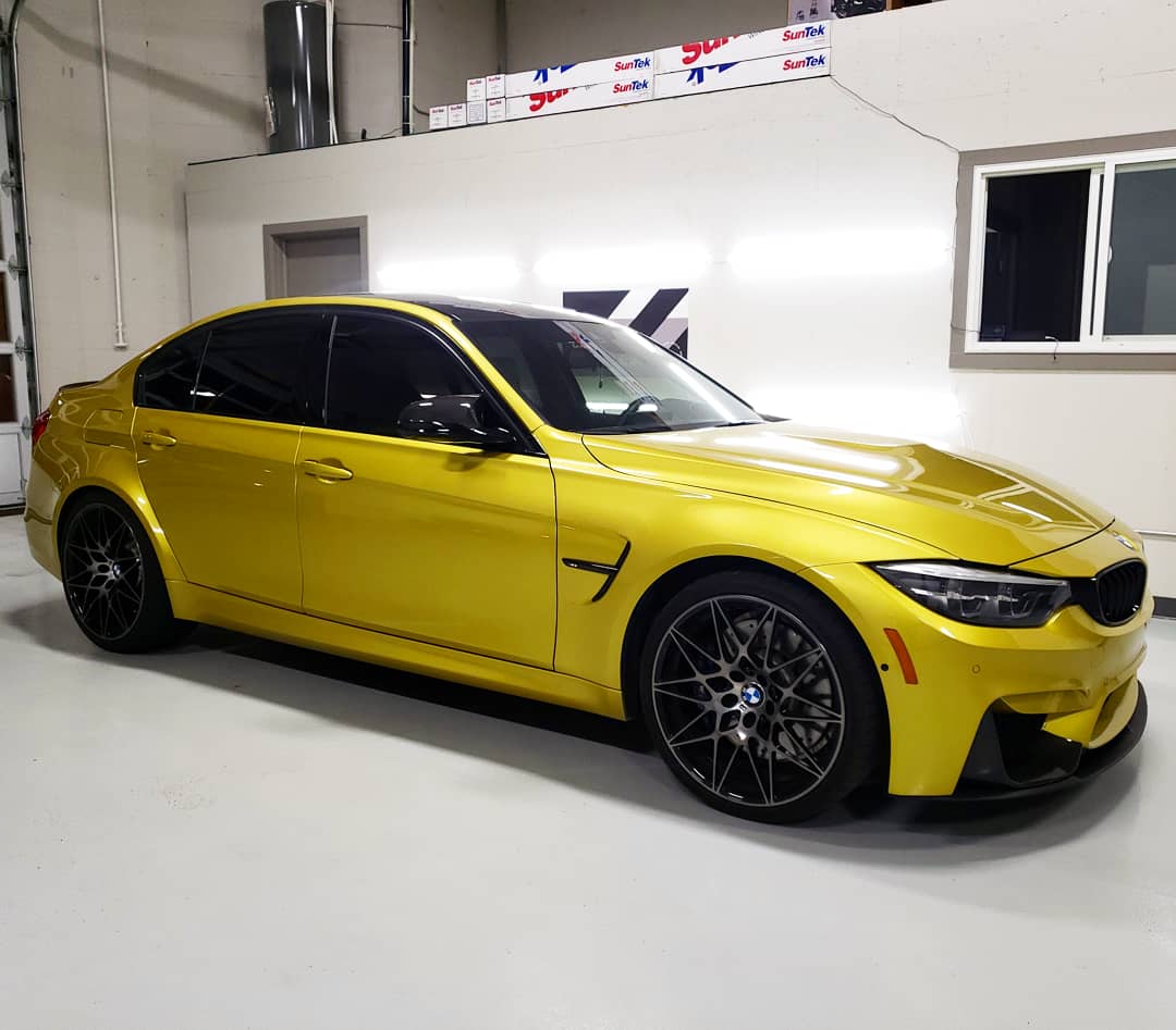 Yellow BMW in the Tint X studio